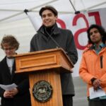 FILE PHOTO: Demonstrators rally on Cambridge Common in a protest