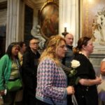 People queue to visit the tomb of the late Pope