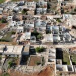 FILE PHOTO: A drone view shows houses without roofs in