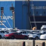 FILE PHOTO: Cars of the Volkswagen Group are waiting to