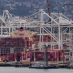 A cargo ship full of shipping containers is seen at