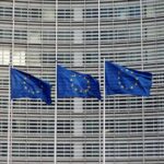 FILE PHOTO: EU flags flutter outside the EU Commission headquarters