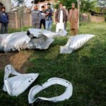Metal debris lies on the ground in Wuyan