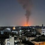FILE PHOTO: Smoke rises in the sky following U.S-led airstrikes