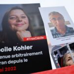 Supporters and relatives of French citizens detained in Iran gather