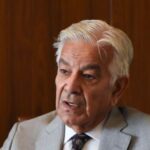Pakistan’s Defence Minister Khawaja Muhammad Asif speaks during an interview
