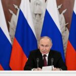 Russian President Vladimir Putin gives a statement to the media