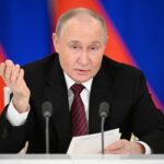 Russian President Vladimir Putin gives a statement to the media