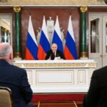 Russian President Vladimir Putin gives a statement to the media