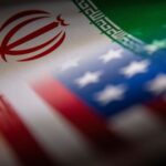 Illustration shows Iran’s and U.S.’ flags