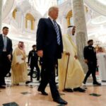 FILE PHOTO: Trump walks with Saudi Arabia’s King Salman to