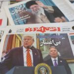 An Iranian newspaper with a cover photo of U.S. President