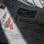 An Iranian newspaper with a cover photo of Iran, Oman