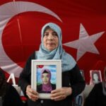 Hatice Levent holds a picture of her daughter Fadime who
