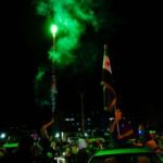 People celebrate after U.S. President Donald Trump said on Tuesday