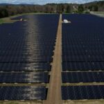 FILE PHOTO: Solar panels are arrayed on Earth Day in