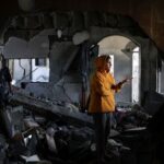Aftermath of an Israeli strike on a house, in Khan