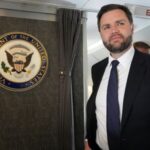 Vice President JD Vance talks to reporters on board of