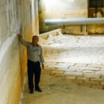 Khaled Hassan, director of Ein al-Fejeh spring, points to where