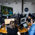Journalists of the independent news outlet Telex work at their