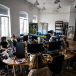 Journalists of the independent news outlet Telex work at their