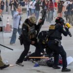 FILE PHOTO: Protesters gather around the Los Angeles Federal Building