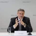 Graz police and prosecutors hold a press conference following school