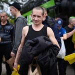 Ukrainian POWs are seen after a swap at an unknown