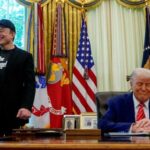 FILE PHOTO: U.S. President Donald Trump and Elon Musk attend