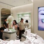 People visit a newly opened Popop store, Pop Mart’s premium