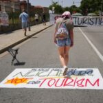 Anti-tourism activists launch coordinated protests in Spain, Portugal and Italy