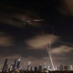 Missiles launched from Iran are intercepted as seen from Tel