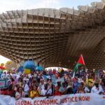 March demanding a UN-led framework for sovereign debt resolution, in