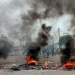 People protest against Togo’s longtime leader, Faure Gnassingbe, in Lome