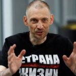 Belarus opposition figure Syarhei Tsikhanouski speaks during interview in Vilnius