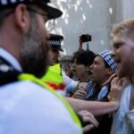 Supporters of the pro-Palestinian group Palestine Action scuffle with police