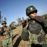 Soldiers of Kachin Independence Army (KIA) man their position at
