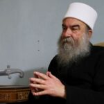 Syrian Druze leader Sheikh Hikmat al-Hajri attends an interview with