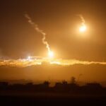 IDF flares light sky above Gaza seen from Israeli side