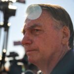 Brazil’s former President Jair Bolsonaro speaks to media as he