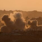 FILE PHOTO: Explosions in Gaza seen from Israeli side