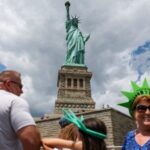 People visit the Statue of Liberty in New York