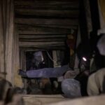 FILE PHOTO: Miners work in the Rubaya coltan mine in