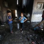 Aftermath of an Israeli strike on a school sheltering displaced
