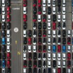 A drone view shows new vehicles at the Kansas City