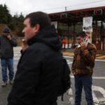 Codelco’s security personnel block the access to the El Teniente