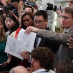 U.S. President Trump meets members of the media at the