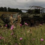 Ukrainian servicemen attend military drills at a training ground in