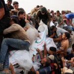 Palestinians seek aid supplies in Khan Younis, southern Gaza Strip