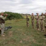Ukrainian servicemen attend military drills at a training ground in